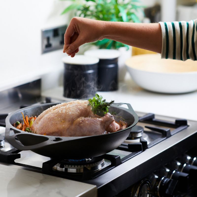 Solidteknics AUS-ION™ Seasoned Iron Wok lifestyle image